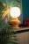 lampa stołowa Ferroluce Copacabana w salonie na komodzie